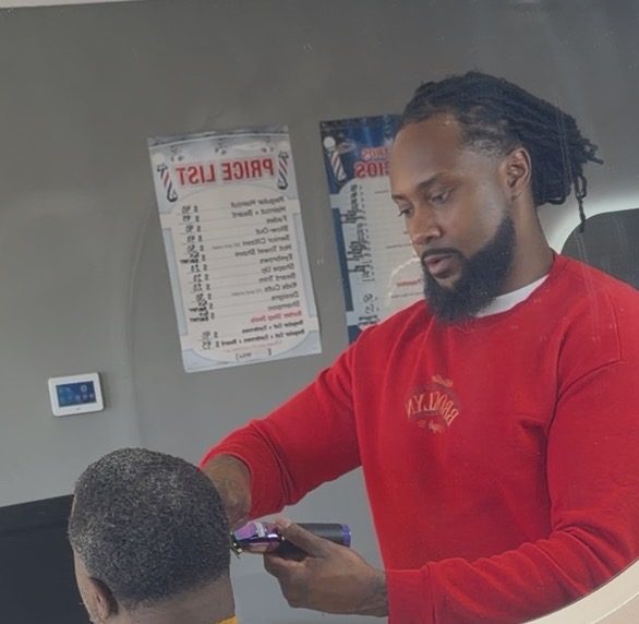 Blue The Barber at Keep It Fresh Barbershop