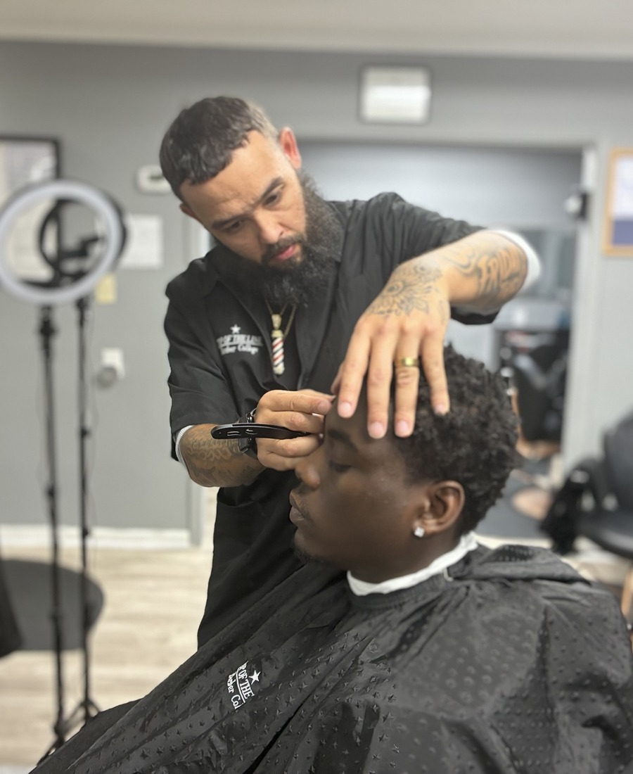 Jay cutting hair at Keep It Fresh Barbershop in Conway SC