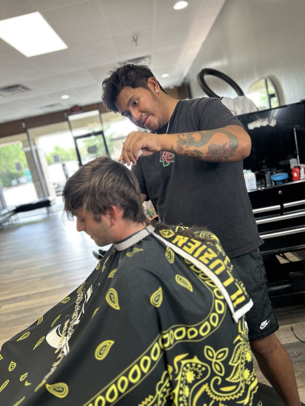 Oscar Cruz at Keep It Fresh Barbershop